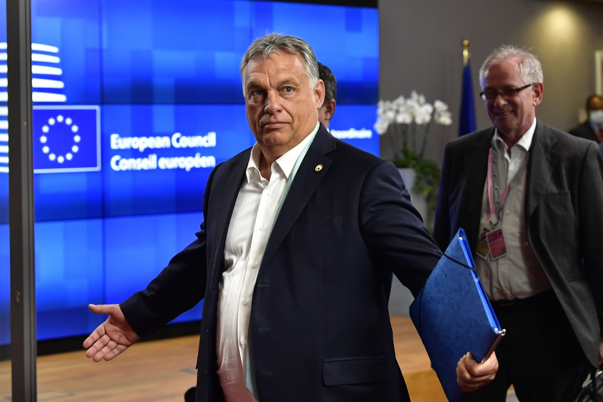 Hungary's Prime Minister Viktor Orban leaves the building after an EU summit in Brussels, Saturday, July 18, 2020. Leaders from 27 European Union nations met face-to-face for a second day of an E ...