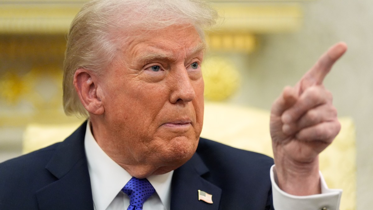 President Donald Trump points to a reporter to ask a question as he meets with NATO Secretary General Mark Rutte in the Oval Office of the White House, Wednesday, Oct. 22, 2025, in Washington. (AP Pho ...