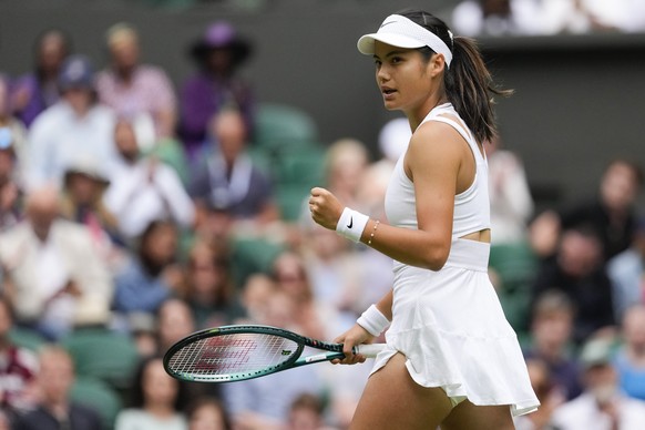Emma Raducanu of Britain reacts after winning a point against Renata Zarazua of Mexico during their first round match of the Wimbledon tennis championships in London, Monday, July 1, 2024. (AP Photo/A ...