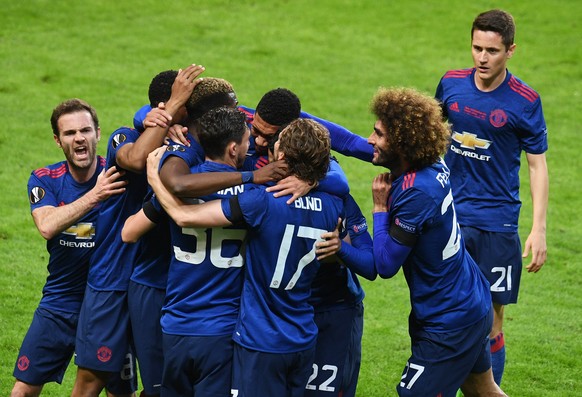 epa05987457 Players of Manchester United celebrate after scoring the opening goal during the UEFA Europa League final between Ajax Amsterdam and Manchester United at Friends Arena in Stockholm, Sweden ...