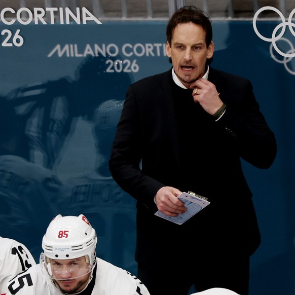 epa12755009 Switzerland ́s head coach Patrick Fischer during the Men's Ice Hockey quarterfinal match between Finland and Switzerland at the Milano Cortina 2026 Winter Olympic Games in Milano, Ita ...
