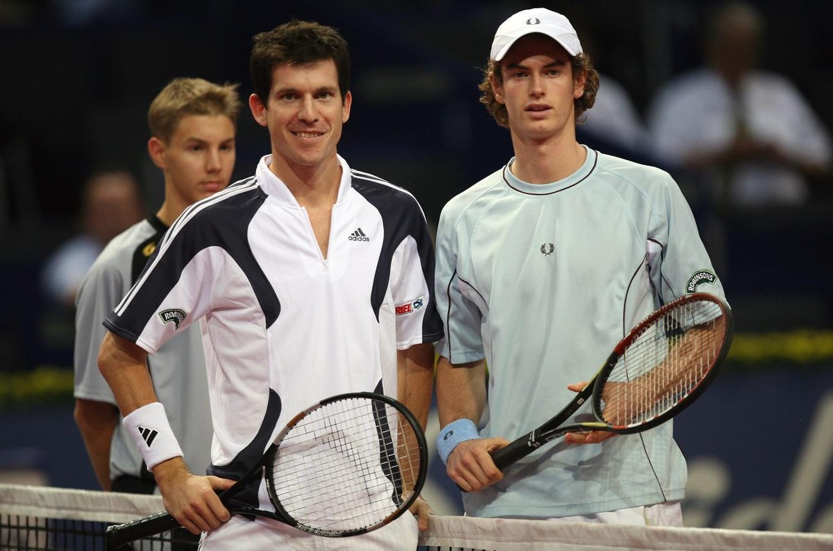 England's Tim Henman, left, and Andy Murray pose for the photopgraphers prior to their first round match at the Swiss Indoors tennis tournament in Basel, Switzerland, Wednesday October 26, 2005.  ...