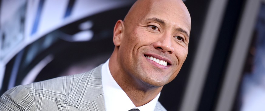 FILE - In this May 26, 2015 file photo, Dwayne Johnson arrives at the premiere of &quot;San Andreas&quot; at the TCL Chinese Theatre in Los Angeles. While speaking to TV critics Thursday, July 30, 201 ...