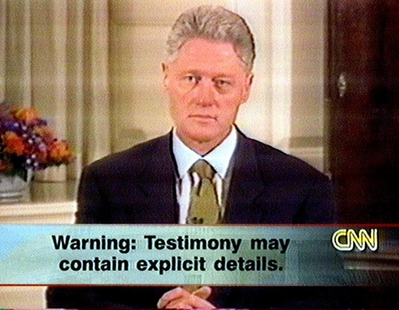 PRI10 - 19980921 - WASHINGTON, DC, UNITED STATES : This 21 September photograph taken from CNN television shows US President Bill Clinton testifying in the Map Room at the White House in Washington, D ...