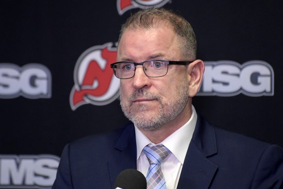 FILE - New Jersey Devils general manager Tom Fitzgerald speaks during an NHL hockey news conference, Tuesday, Nov. 30, 2021, in Newark, N.J. (AP Photo/Bill Kostroun, File)
Tom Fitzgerald