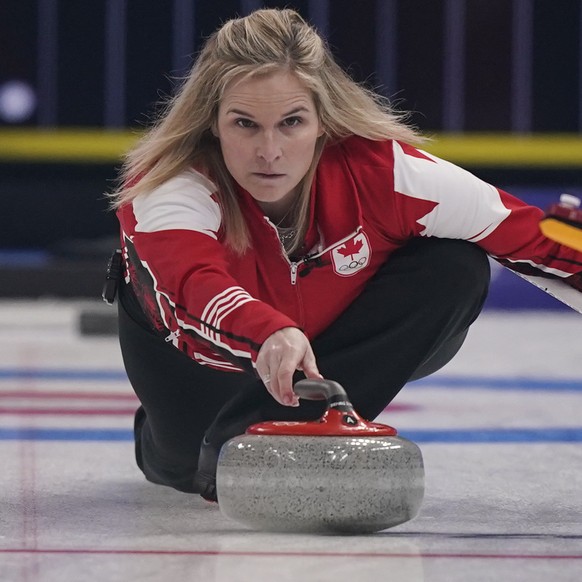 Canada&#039;s Jennifer Jones throws a rock during a women&#039;s curling match against the United States at the Beijing Winter Olympics Wednesday, Feb. 16, 2022, in Beijing. (AP Photo/Brynn Anderson)
 ...