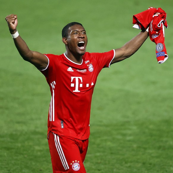 epa08620895 David Alaba of Munich celebrates after the UEFA Champions League final between Paris Saint-Germain and Bayern Munich in Lisbon, Portugal, 23 August 2020. Bayern Munich won 1-0. EPA/Matt Ch ...