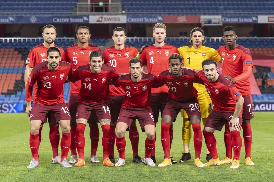 The Swiss team, top from left: Haris Seferovic, Manuel Akanji, Granit Xhaka, Nico Elvedi, goalkeeper Yann Sommer and Breel Embolo, and bottom from left, Ricardo Rodriguez, Steven Zuber, Remo Freuler,  ...