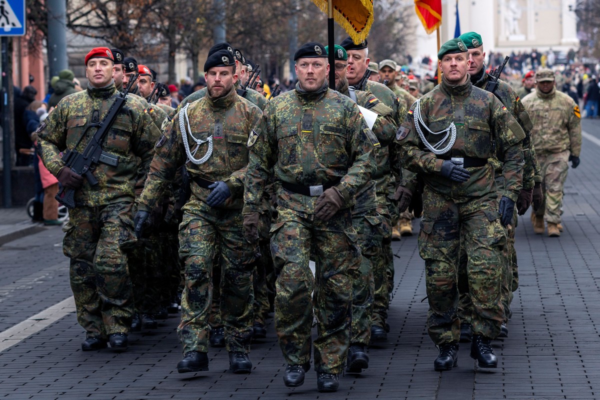 Members of the German army march during a military parade ceremony marking the 107th anniversary of the Lithuanian military, on Armed Forces Day in Vilnius, Lithuania, Sunday, Nov. 23, 2025. (AP Photo ...