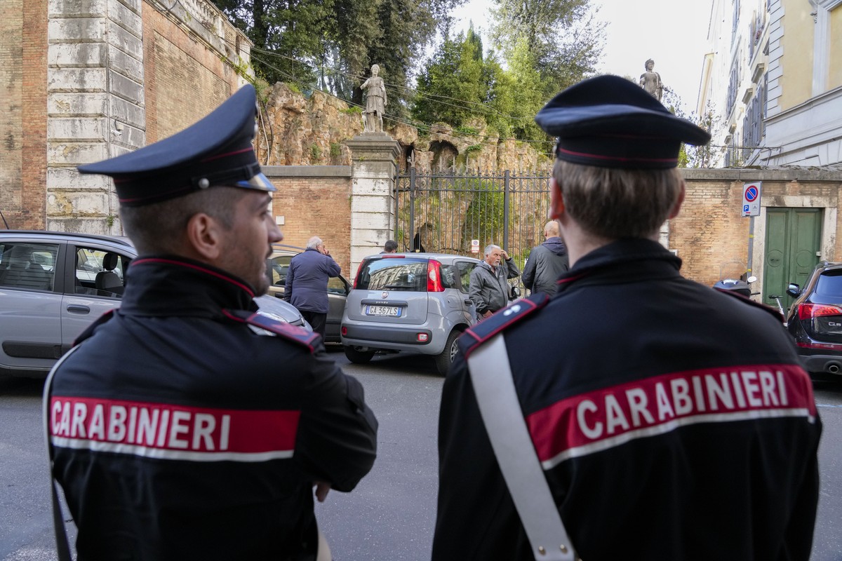 Carabinieri police officers stand in front of The Casino dell'Aurora, also known as Villa Ludovisi, as they execute an eviction order, in Rome, Thursday, April 20, 2023. Texas-born Princess Rita  ...