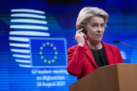 European Commission President Ursula von der Leyen listens to questions during a media conference, after a virtual G-7 meeting on the ongoing crisis in Afghanistan, at the European Council building in ...