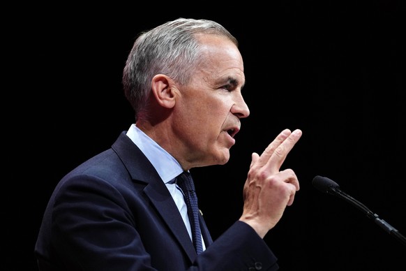 Canadian Prime Minister Mark Carney speaks on stage at his campaign headquarters after the Liberal Party won the Canadian election in Ottawa on Tuesday, April 29, 2025. (Justin Tang/The Canadian Press ...