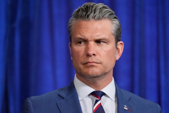 Defense Secretary Pete Hegseth listens during a news conference with President Donald Trump at Mar-a-Lago, Saturday, Jan. 3, 2026, in Palm Beach, Fla. (AP Photo/Alex Brandon)
Trump US Venezuela