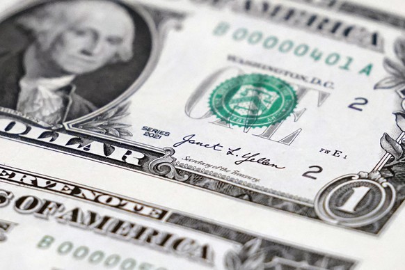 File - A newly printed U.S. dollar bill is shown at the Bureau of Engraving and Printing&#039;s Western Currency Facility in Fort Worth, Texas, on Dec. 8, 2022. Across the developing world, many count ...