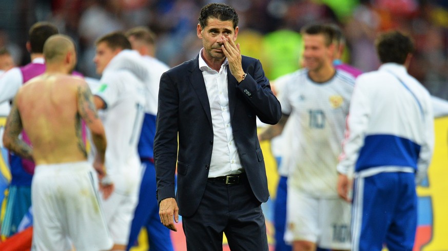 epa06855789 Spain&#039;s head coach Fernando Hierro (C) reacts after the penalty shootout of the FIFA World Cup 2018 round of 16 soccer match between Spain and Russia in Moscow, Russia, 01 July 2018.  ...