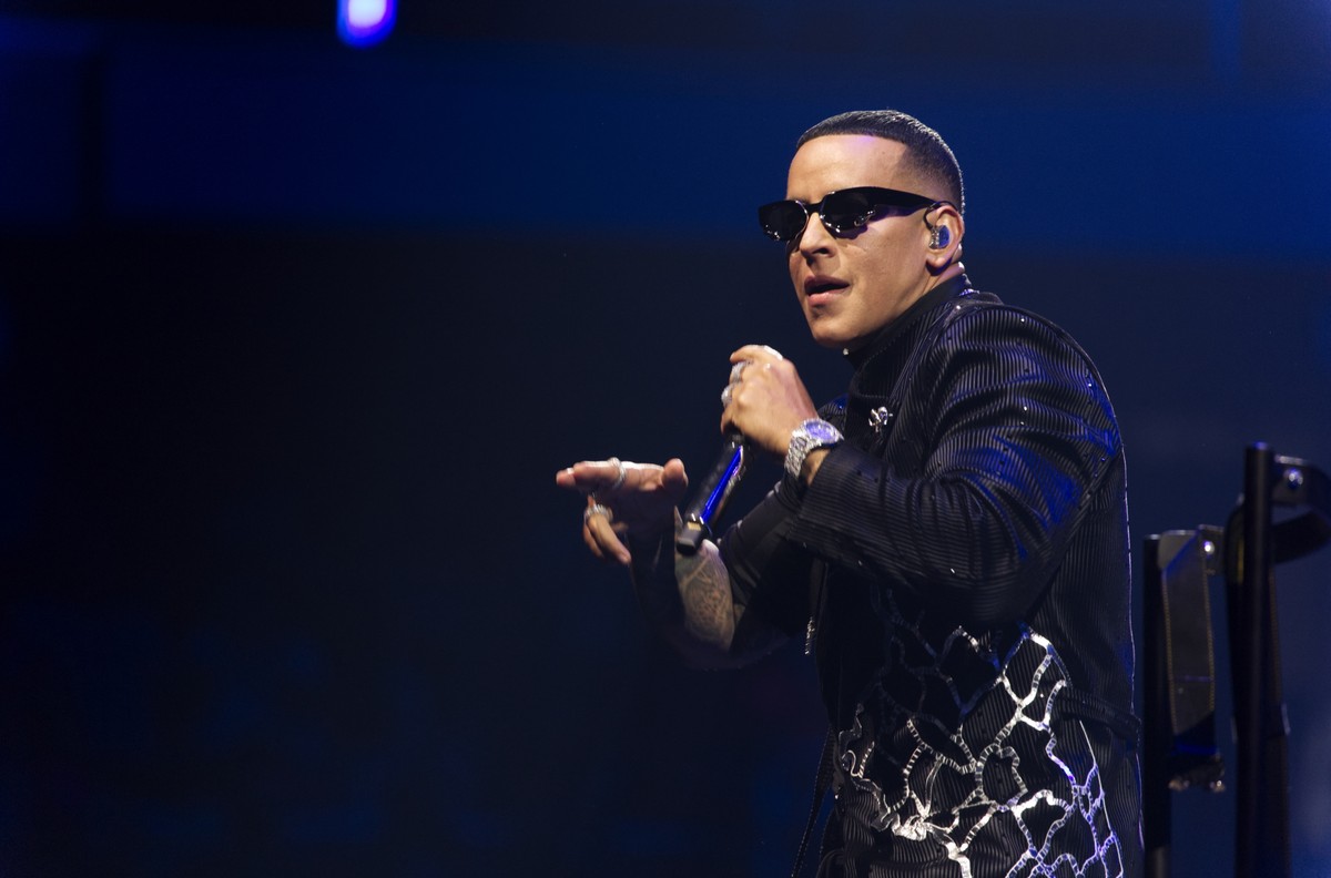 epa11005029 Puerto Rican artist Daddy Yankee performs during his 'La Meta' concert at Jose Miguel Agrelot Coliseum in San Juan, Puerto Rico, 30 November 2023. Daddy Yankee delighted the inha ...