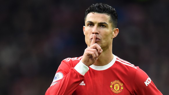 epa09623809 Cristiano Ronaldo of Manchester United gestures during the English Premier League soccer match between Manchester United and Crystal Palace in Manchester, Britain, 05 December 2021. EPA/PE ...