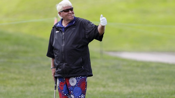 John Daly hits on the practice green during the pro-am at the PGA Tour Champions Principal Charity Classic golf tournament, Thursday, May 30, 2019, in Des Moines, Iowa. (AP Photo/Charlie Neibergall)