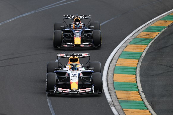 epa12802845 Visa Cash App Racing Bulls Formula One Team driver Arvid Lindblad (41) leads Oracle Red Bull Racing driver Max Verstappen (3) during the 2026 Australian Grand Prix at Albert Park Circuit i ...