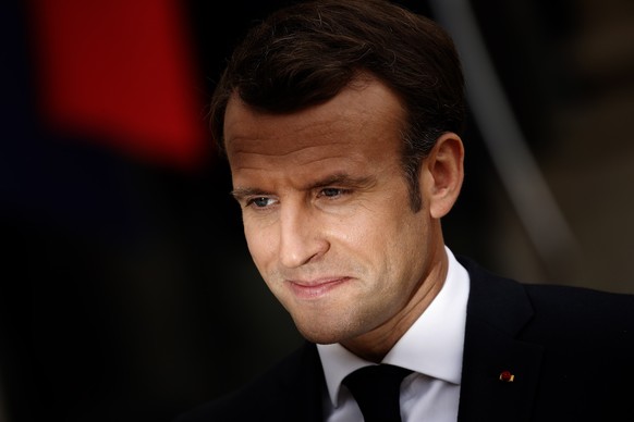 epaselect epa07480418 French President Emmanuel Macron looks on as he speaks to journalists prior his meeting with Irish Taoiseach (Prime Minister) Leo Varadkar (not pictured) at the Elysee Palace in  ...