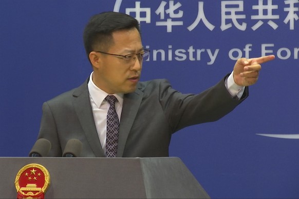 Chinese Foreign Ministry spokesperson Zhao Lijian gestures during a news conference at the Ministry of Foreign Affairs in Beijing, Wednesday, July 27, 2022. China&#039;s government on Wednesday reject ...