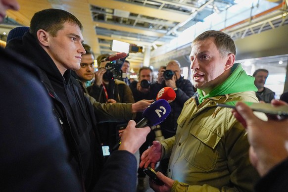 epa10445921 Wagner group mercenary Andrey Medvedev (L) meets with Russian human rights activist, founder of gulagu.net Vladimir Osechkin (R) in Gardermoen, Norway, February 03, 2023. Medvedev who serve…