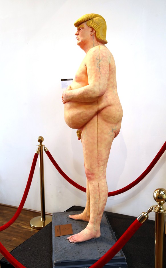 epa06705534 The &#039;Emperor Has No Balls&#039; or more commonly referred to as &#039;Naked Trump&#039; statue by West Coast anarchist collective UNDERLINE signed by Ginger is on display to be auctio ...