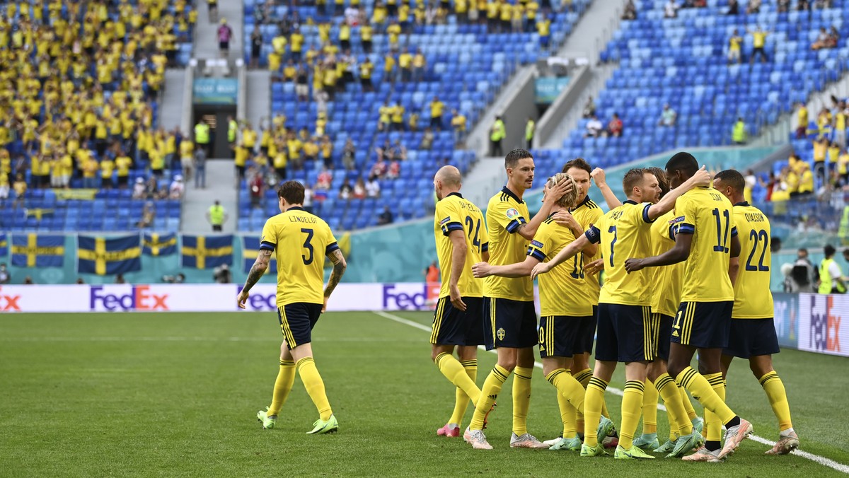 Sweden players celebrate after Emil Forsberg scored his side's opening goal during the Euro 2020 soccer championship group D match between Sweden and Poland, at the St. Petersburg stadium in St.  ...