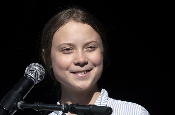 FILE - In this Sept. 27, 2019 file photo, Swedish climate activist and student Greta Thunberg smiles on stage after addressing the Climate Strike in Montreal, Quebec. The teenager who garnered interna ...