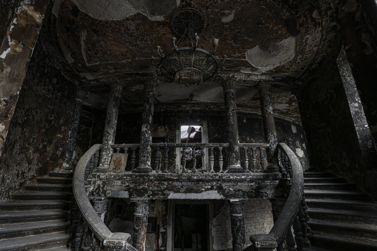 epa10355693 An interior view of the destroyed Drama Theatre in Mariupol, Ukraine, 08 December 2022. The Mariupol Drama Theater was destroyed on 16 March during Russian airstrikes and the siege of the  ...