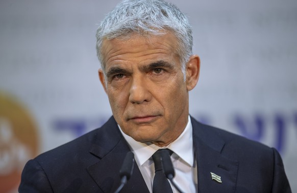 FILE - In this May 6, 2021, file photo, Israeli opposition leader Yair Lapid listens during a news conference in Tel Aviv, Israel. Prime Minister Benjamin Netanyahu&#039;s opponents on Wednesday, June ...