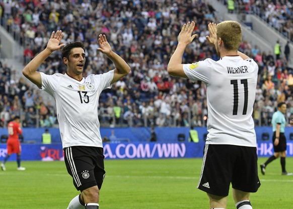 Germany&#039;s Lars Stindl, left, celebrates after scoring the opening goal with his teammate Timo Werner during the Confederations Cup final soccer match between Chile and Germany, at the St.Petersbu ...