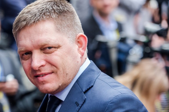 FILE - In this June 27, 2014 file photo Slovakia's Prime Minister Robert Fico arrives for an EU summit in Brussels. Prime Minister Robert Ficos ruling leftist Smer-Social Democracy party is a clear f ...