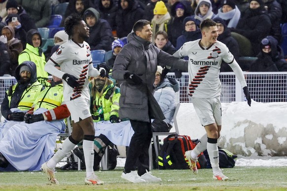 epa11004741 Leverkusen&#039;s Patrik Schick (R) celebrates with his coach Xabi Alonso (C) after scoring the 2-0 goal during the UEFA Europa League group H soccer match between BK Hacken and Bayer Leve ...