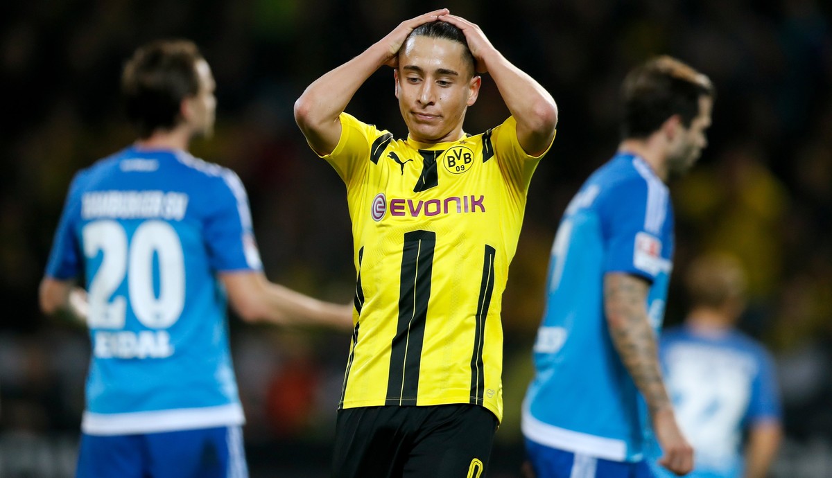 epa05888484 Dortmund's Emre Mor reacts (C) during the German Bundesliga soccer match between Borussia Dortmund and SV Hamburg in Dortmund, Germany, 04 April 2017. EPA/FRIEDEMANN VOGEL (EMBARGO CO ...