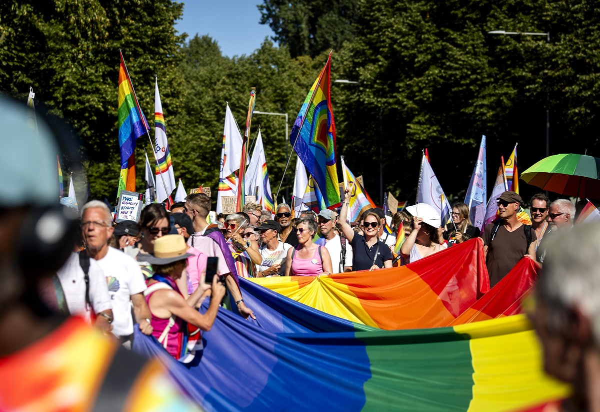 epa13157065 Participants of the Pride March walk towards Museumplein in Amsterdam, the Netherlands, 08 August 2026. The peaceful protest march marks the conclusion of WorldPride, which took place in A ...