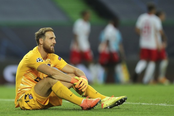 Atletico Madrid&#039;s goalkeeper Jan Oblak is dejected after RB Leipzig scored the second goal during the Champions League quarterfinal match between RB Leipzig and Atletico Madrid at the Jose Alvala ...