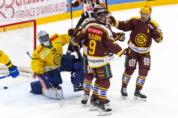Jesse Puljujaervi (GSHC) #9 celebrates his goal with his teammates Jimmy Vesey (GSHC) and PostFinance Top Scorer Markus Granlund (GSHC), right, after scoring the 3:0, during a National League regular  ...