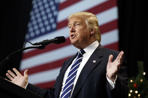 FILE - In this Dec. 13, 2016, photo, President-elect Donald Trump speaks during a rally at the Wisconsin State Fair Exposition Center in West Allis, Wis on Dec. 13, 2016. Two Wisconsin Democratic elec ...