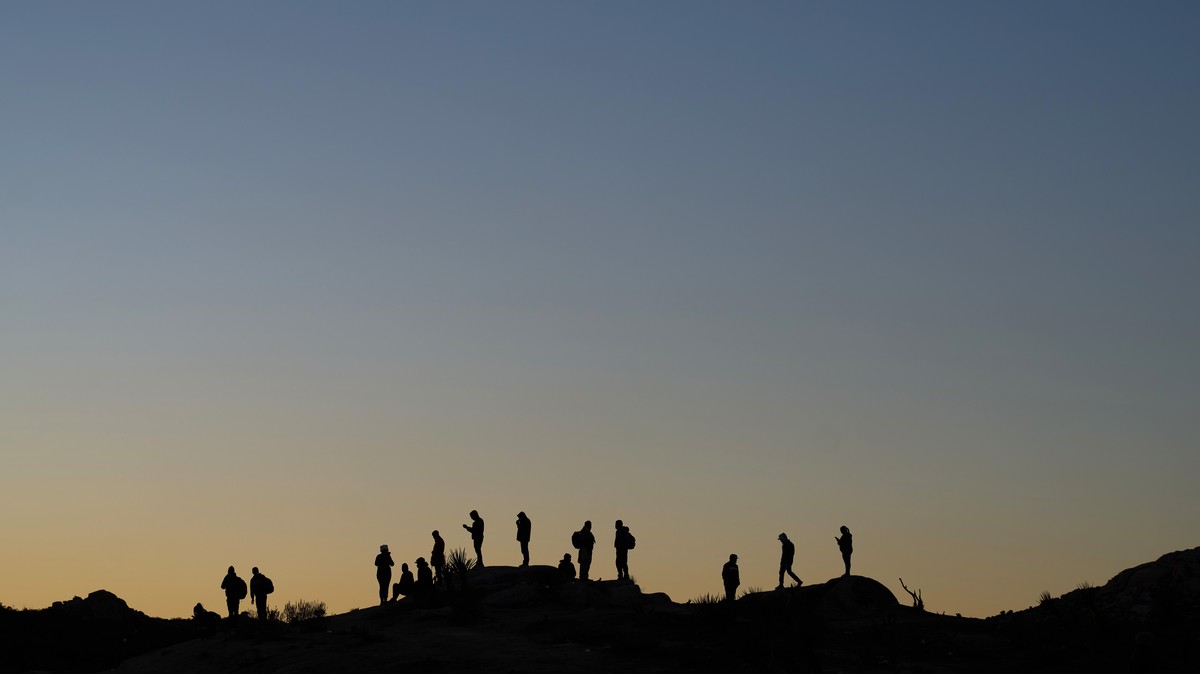 epaselect epa11000533 Migrants wait to be processed by US Border Patrol in Jacumba, California, USA, 28 November 2023. In recent weeks the tiny community of Jacumba, population 600, has been inundated ...