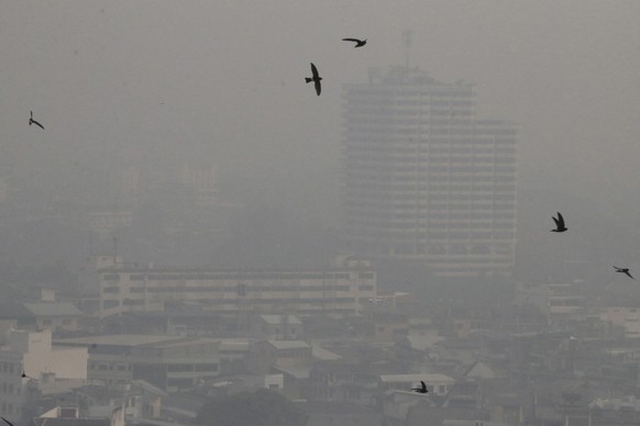 A thick layer of smog covers the city in Chiang Mai province, northern Thailand, Thursday, April 13, 2023. (AP Photo/Wichai Taprieu)