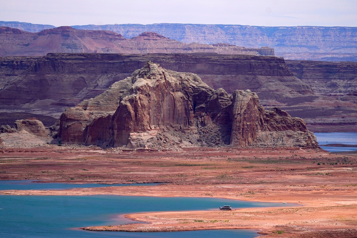 FILE - Low water levels at Wahweap Bay at Lake Powell, along the Upper Colorado River Basin are shown, June 9, 2021, at the Utah and Arizona border at Wahweap, Ariz. (AP Photo/Ross D. Franklin, File)
 ...