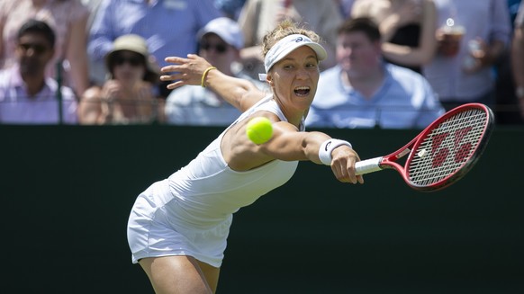 Viktorija Golubic of Switzerland in action during her first round match against Iga Swiatek of Poland, at the All England Lawn Tennis Championships in Wimbledon, London, on Monday, July 1, 2019.(KEYST ...