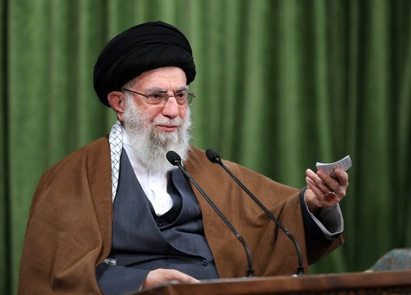 In this picture released by an official website of the office of the Iranian supreme leader, Supreme Leader Ayatollah Ali Khamenei addresses the nation in a televised speech marking the birthday of Is ...