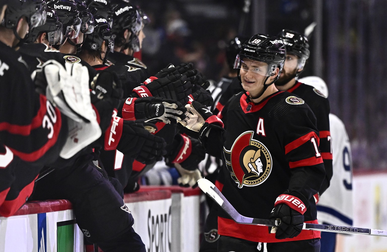 Ottawa Senators&#039; Tim Stutzle (18) celebrates after his goal against the Toronto Maple Leafs during first-period preseason NHL hockey action in Ottawa, Ontario, Sunday, Sept. 24, 2023. (Justin Tan ...