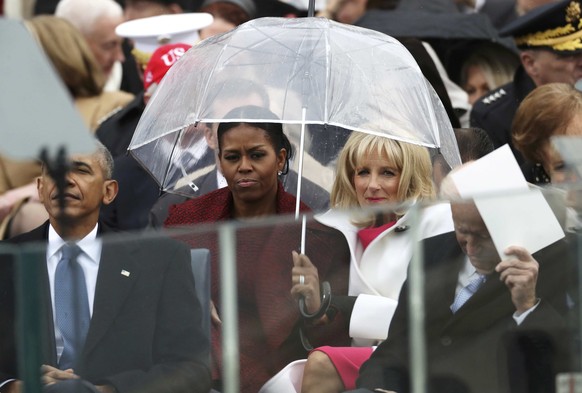 First Lady Michelle Obama (L) and Dr. Jill Biden look on during inauguration ceremonies swearing in Donald Trump as the 45th president of the United States on the West front of the U.S. Capitol in Was ...