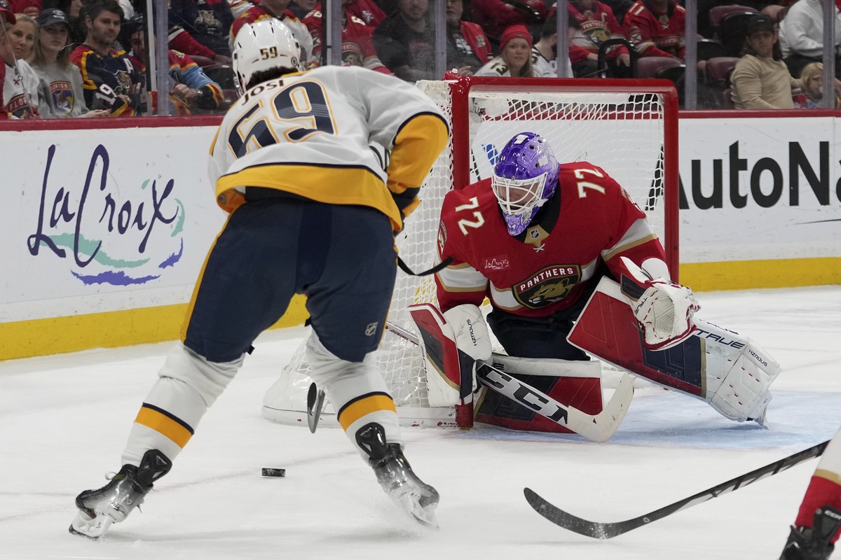 Florida Panthers goaltender Sergei Bobrovsky (72) defends the goal against Nashville Predators defenseman Roman Josi (59) during the first period of an NHL hockey game, Thursday, Nov. 7, 2024, in Sunr ...