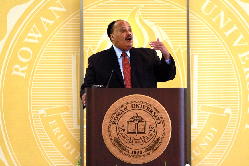 Martin Luther King III, son of Martin Luther King Jr., speaks at Rowan University&#039;s MLK Jr. Scholarship Breakfast Monday Jan. 20, 2014, in Philadelphia. (AP Photo/The Philadelphia Inquirer, David ...