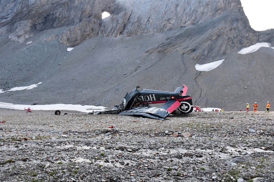 epa06928845 A handout photo made available by Cantonal Police of Grisons shows a wreckege of Junkers JU-52 aircraft after crashing on Piz Segnas above Flims, Switzerland,05 August 2018. According to r ...