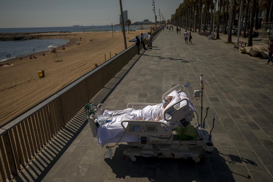 Francisco Espana, 60, looks at the Mediterranean sea from a promenade next to the "Hospital del Mar" in Barcelona, Spain, Friday, Sept. 4, 2020. Francisco spent 52 days in the Intensive Care ...